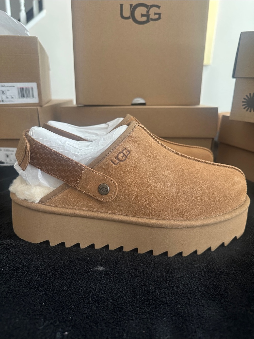 UGG Women’s Lanah. Log Platform Shoes